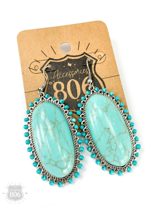 Beaded oval earring with large stone