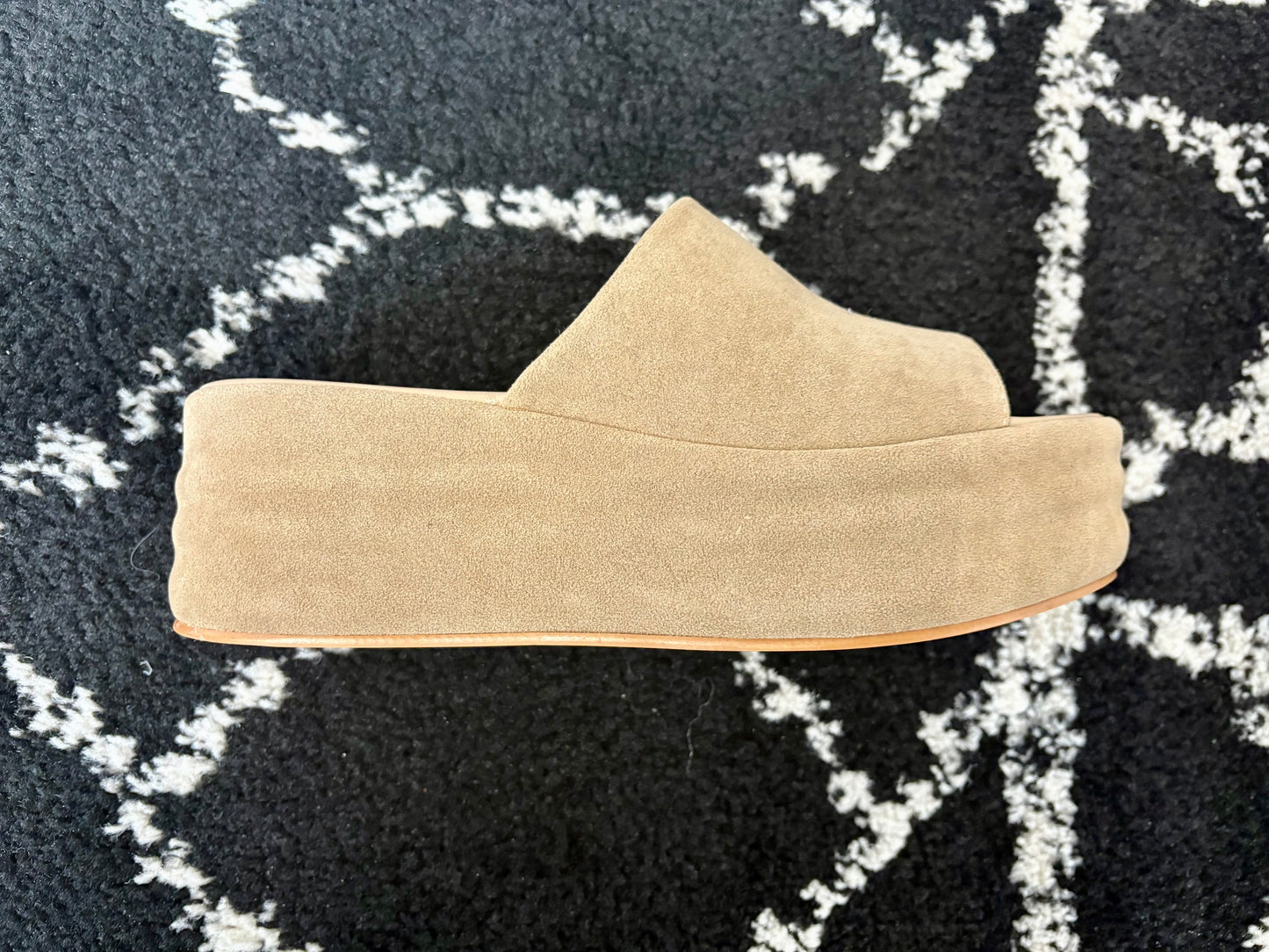 Side view of the Hazel Platform Slide sandal in tan faux suede with a thick, solid platform sole