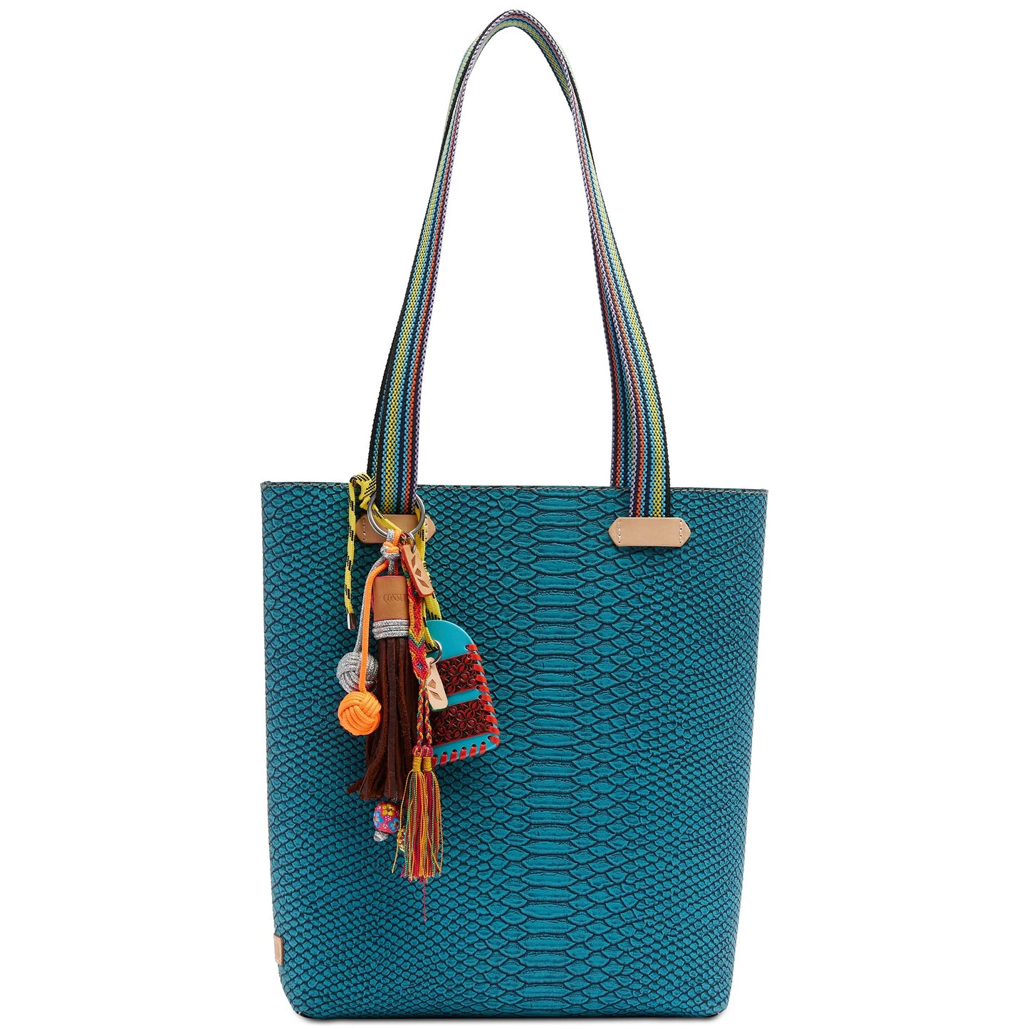 Teal snakeskin-textured Consuela Indy tote bag with rainbow straps and colorful charm tassels & bag tag available at Erin Rose Boutique.