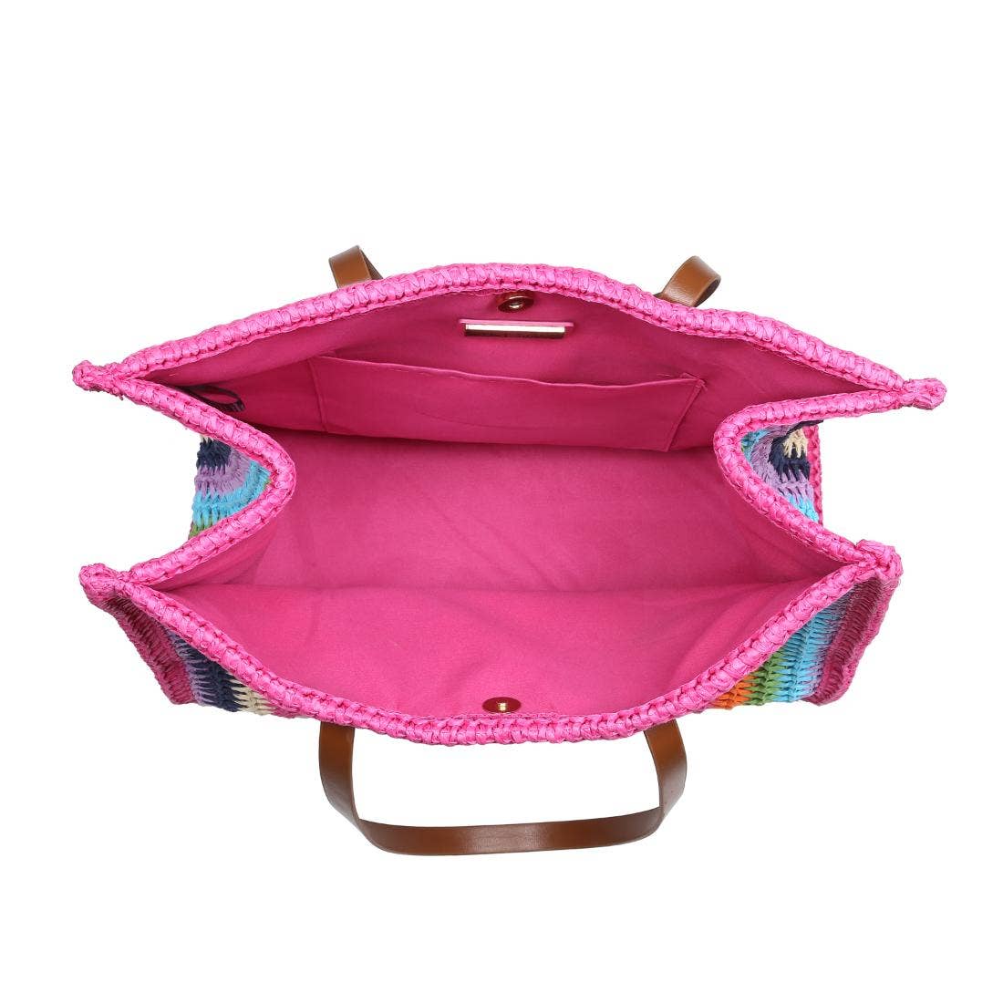 Interior view of rainbow crochet tote bag with bright pink lining and inner pocket, from Erin Rose Boutique