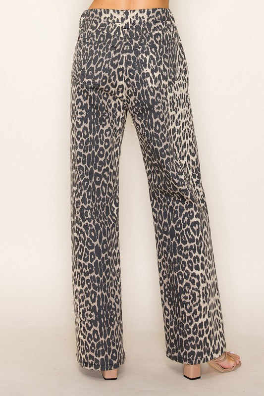 Back view of high-rise leopard print wide-leg pants, bold animal print trousers for trendy women’s boutique fashion