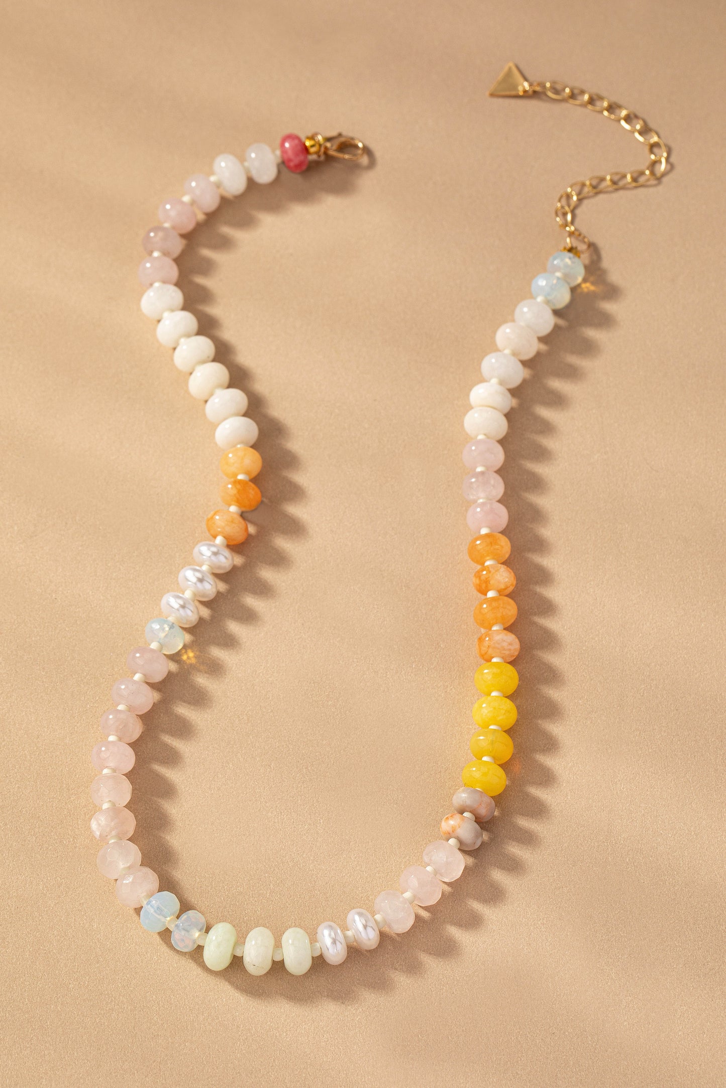 Pastel rainbow agate beaded necklace with gold extender clasp and soft gradient colors