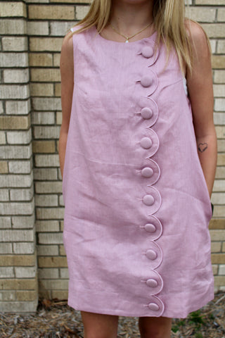 model wearing rose blush scallop button shift dress with feminine detail and relaxed fit from Erin Rose Boutique