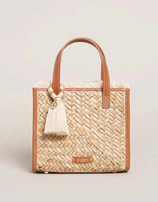 Woven Straw handbag with leather handles and tassel available at Erin Rose Boutique