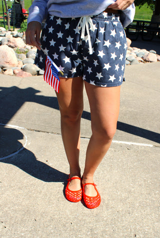 Lightweight Americana-inspired shorts with white star print.
