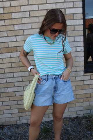 Person wearing Hidden side insert denim shorts 