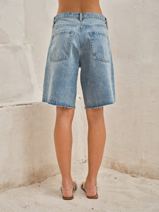 Back of Trendy Bermuda jean shorts with a relaxed fit and vintage wash