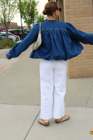 Jenni Bubble Denim Jacket styled with white jeans and a relaxed fit.