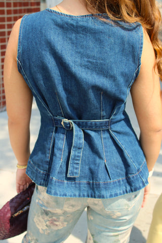 Back of Bailey denim vest with adjustable buckle belt and princess seams