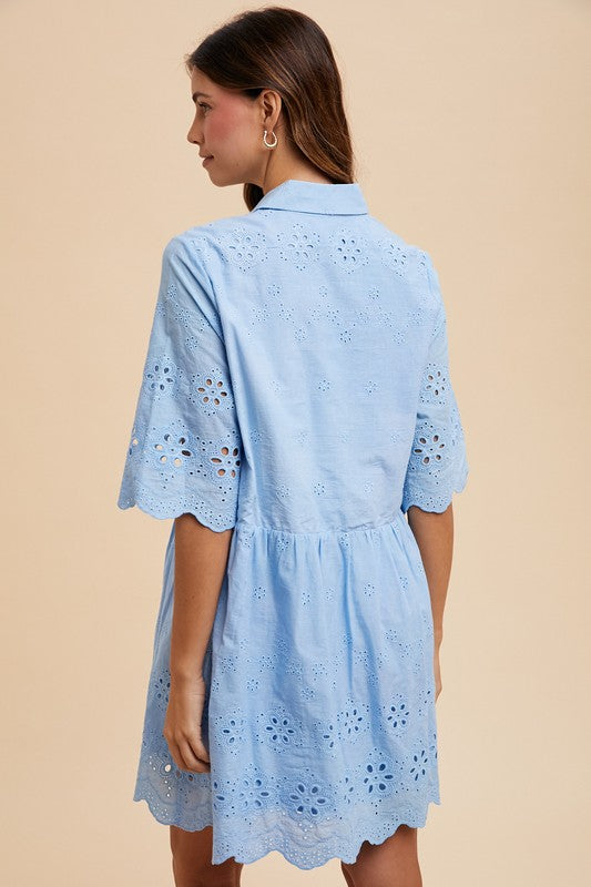 Back view of light blue eyelet babydoll dress with floral cutouts and scalloped hem, perfect for casual summer outfits