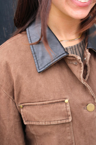 Women's brown jacket with black contrast cuffs
