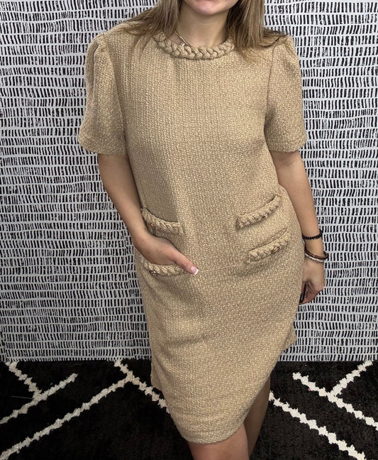 Chic camel tweed knit midi dress with short sleeves, braided trim neckline, and front pocket accents – boutique style at Erin Rose Boutique.