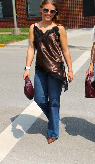 Brown polka dot cami with black lace hem styled with denim & burgundy woven handbag  available at Erin Rose Boutique