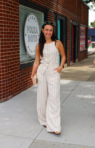 Women's Clara Stripe Linen Pants with a high-rise waist and wide-leg silhouette.