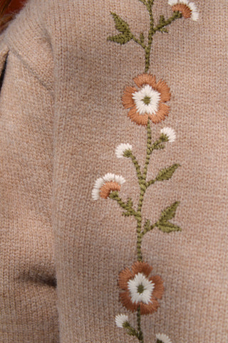 Close Up of Floral embroidery detail on taupe Flora Knit Sweater
