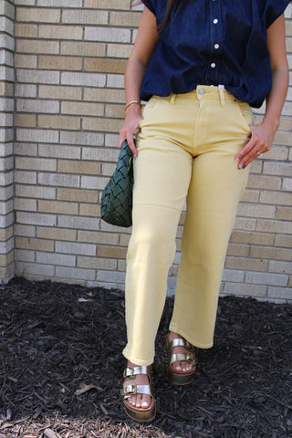 JBD butter yellow straight leg ankle jeans styled with a dark wash denim button front top