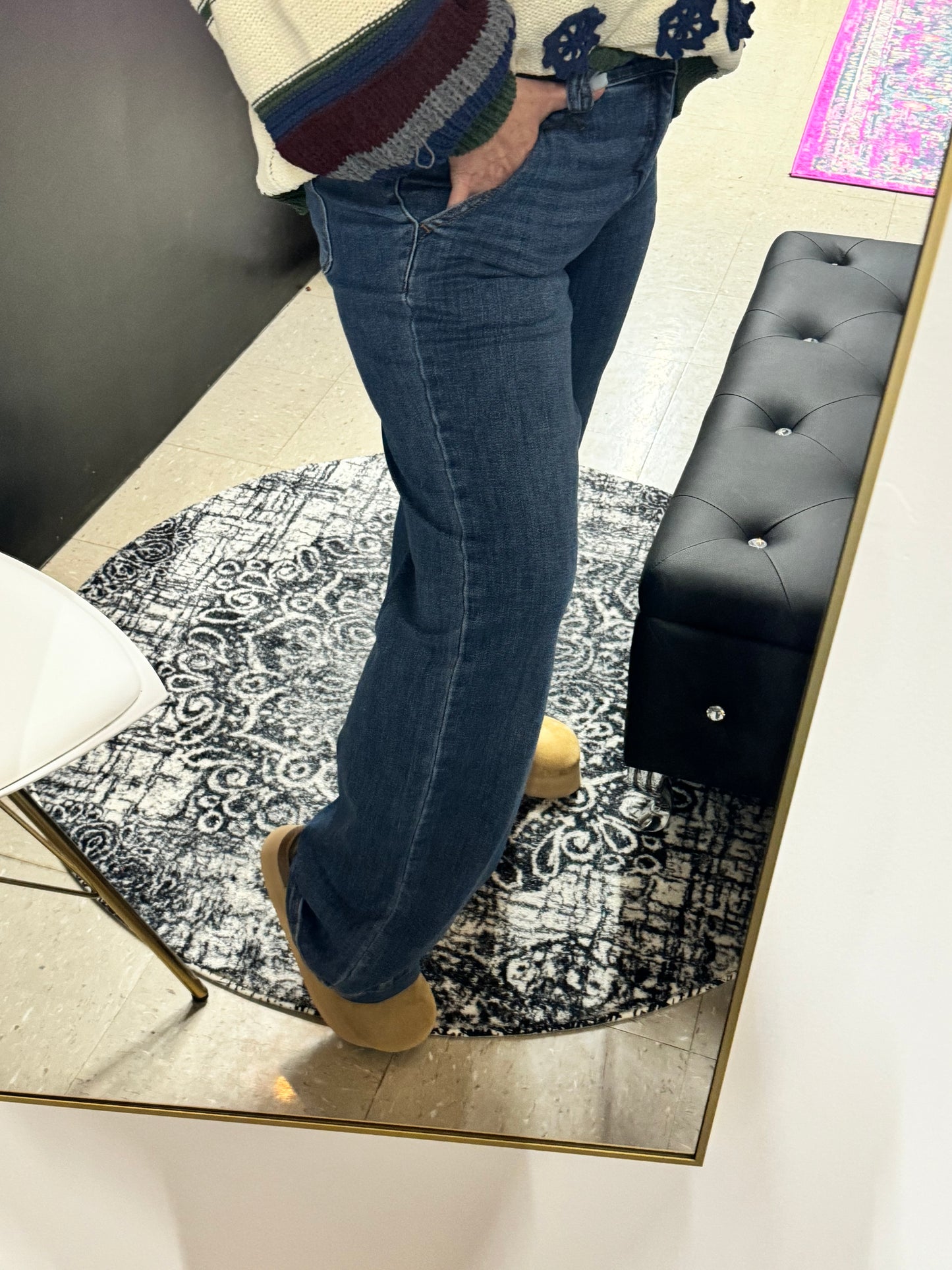 Side view of Judy Blue wide leg jeans in dark wash with high-rise double button waistband, designed for a flattering and comfortable fit