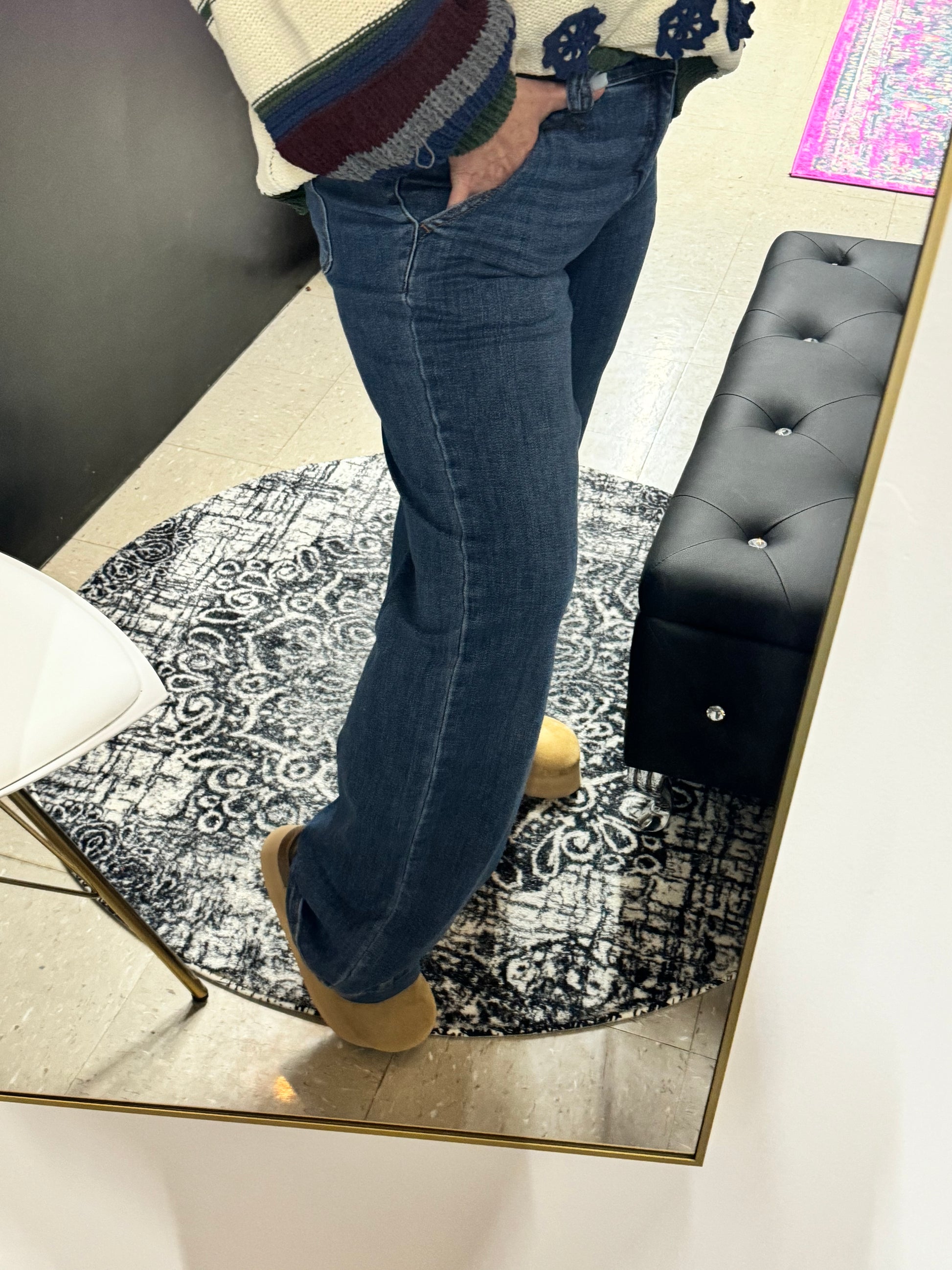 Side view of Judy Blue wide leg jeans in dark wash with high-rise double button waistband, designed for a flattering and comfortable fit