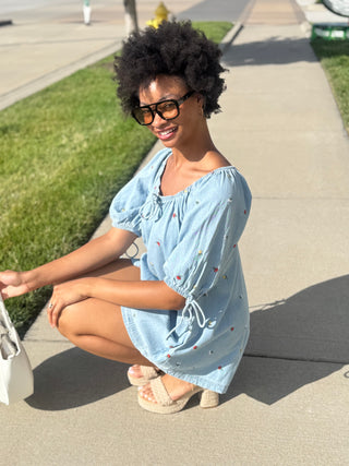 Lightweight denim romper with tiny multicolor embroidered flowers