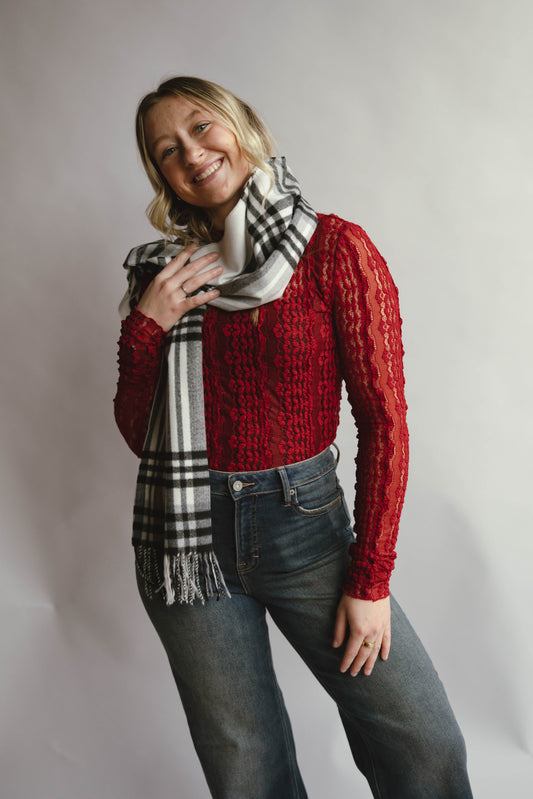 Maison Rouge red lace long sleeve top with sheer floral lace detail and fitted silhouette available at Erin Rose boutique