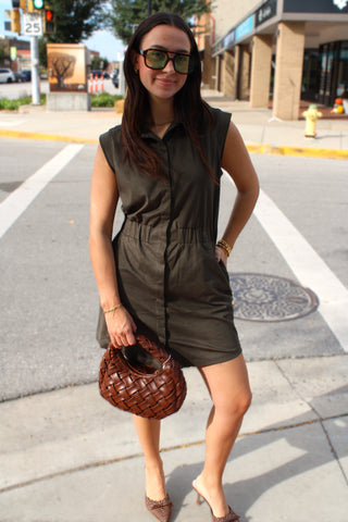 Olive green sleeveless dress styled for everyday wear
