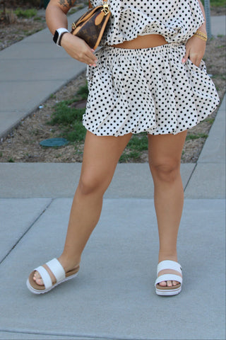 Polka dot bubble hem shorts black and white styled with sandals summer outfit