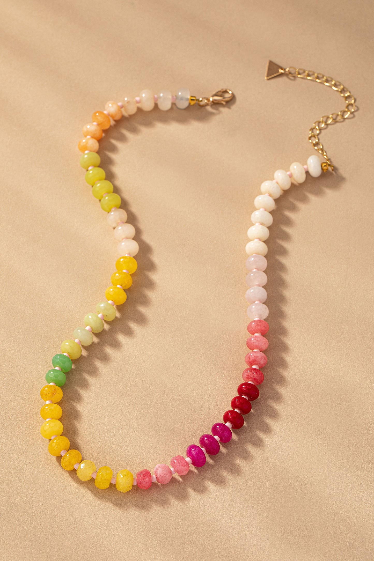 Colorful rainbow gradient agate beaded necklace with gold clasp and adjustable chain