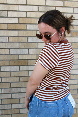 side view of striped short sleeve knit tee tucked into denim shorts everyday look available at Erin Rose Boutique