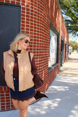 Tan vest featuring diamond quilted stitching