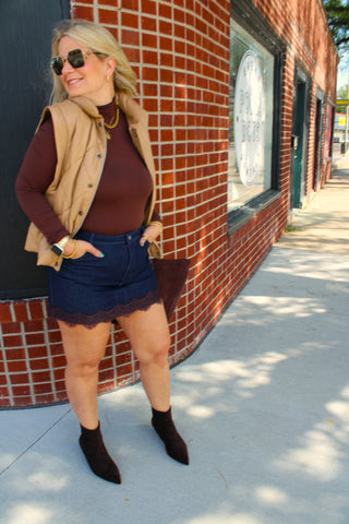 Women's tan padded vest with front pockets