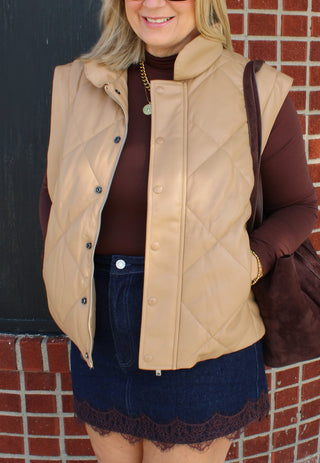 Women's tan sleeveless puffer vest for fall