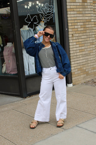 Jenni Bubble Denim Jacket styled with light wash jeans and a relaxed fit.