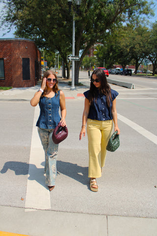 Women's transitional outfits featuring dark denim tops, butter yellow jeans and floral denim
