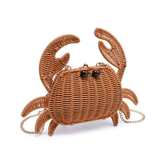 Beach-ready woven crab handbag with detailed wicker construction and playful seaside style.